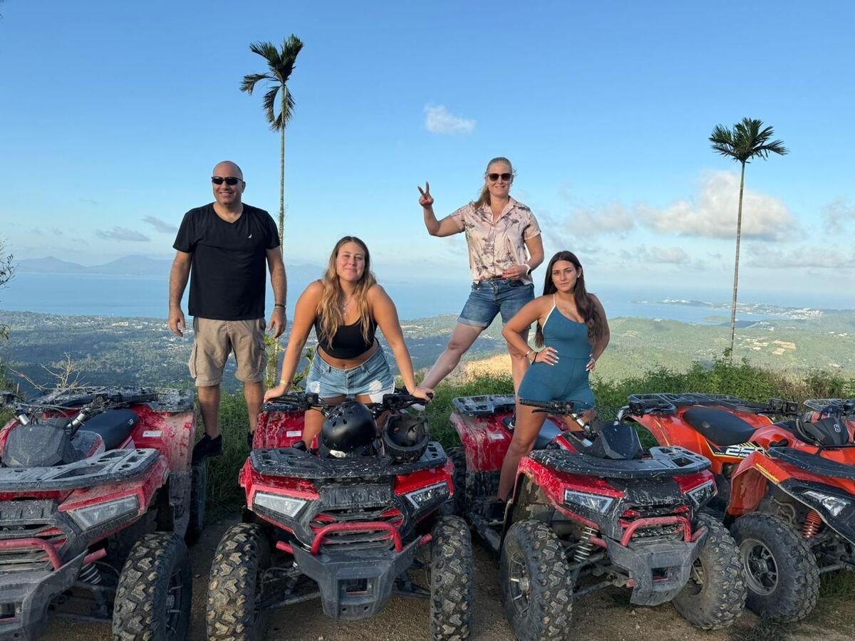 ATV riders at panoramic viewpoint overlooking Koh Samui coastline